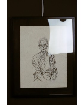 Siedzący mężczyzna....