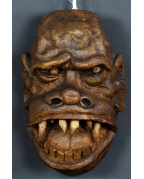 Łeb goryla. Płaskorzeźba....