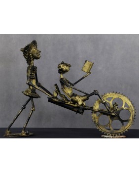 Podróżujący taczką. Metal....