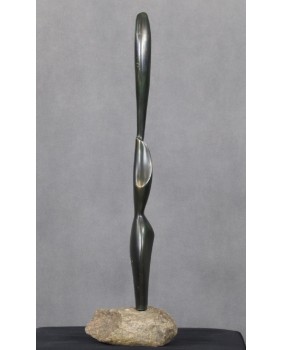 Kobieta. Brąz. Kamień....