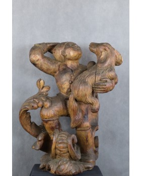 Młodzieniec z psem. Drewno....